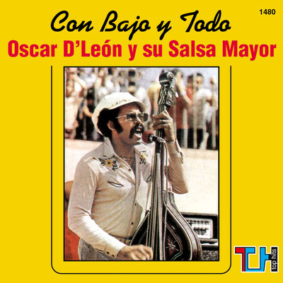 The cover of Con bajo y todo by Oscar D'León