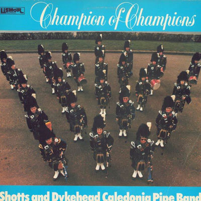 The cover of Champion of Champions by Shotts & Dykehead Caledonia Pipe Band