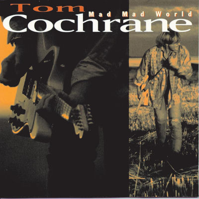 The cover of Mad Mad World by Tom Cochrane