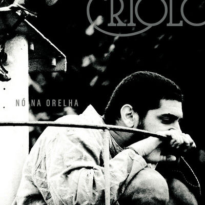 The cover of Nó na Orelha by Criolo