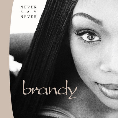 The cover of Never Say Never by Brandy