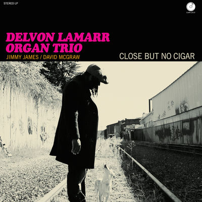 The cover of Close but No Cigar by Delvon Lamarr Organ Trio